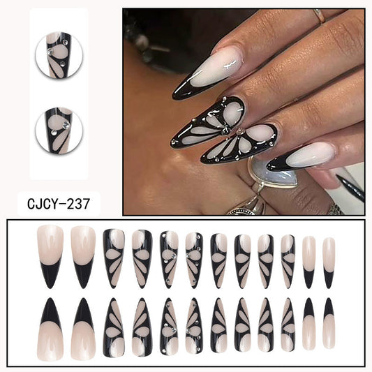 Gothic Elegance Stiletto Nails with Butterfly Design