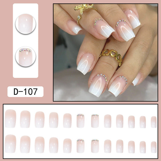 Elegant French Manicure with Crystal Embellishments